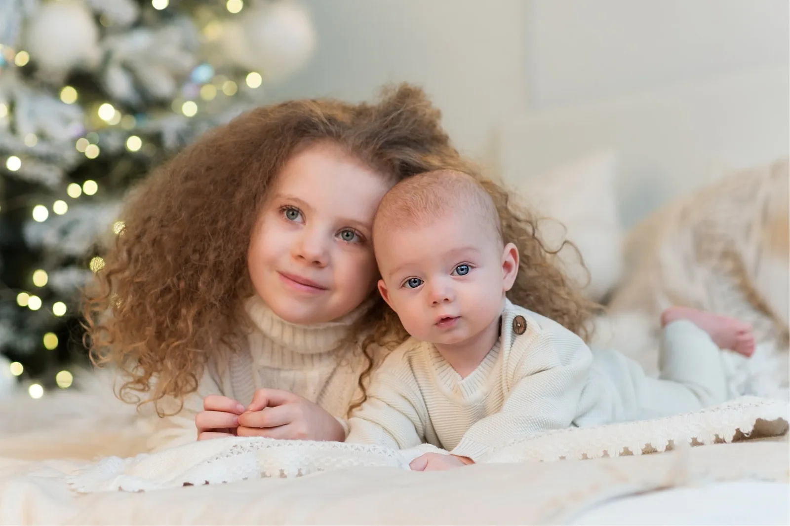 Cuddles with Siblings Under the Tree.