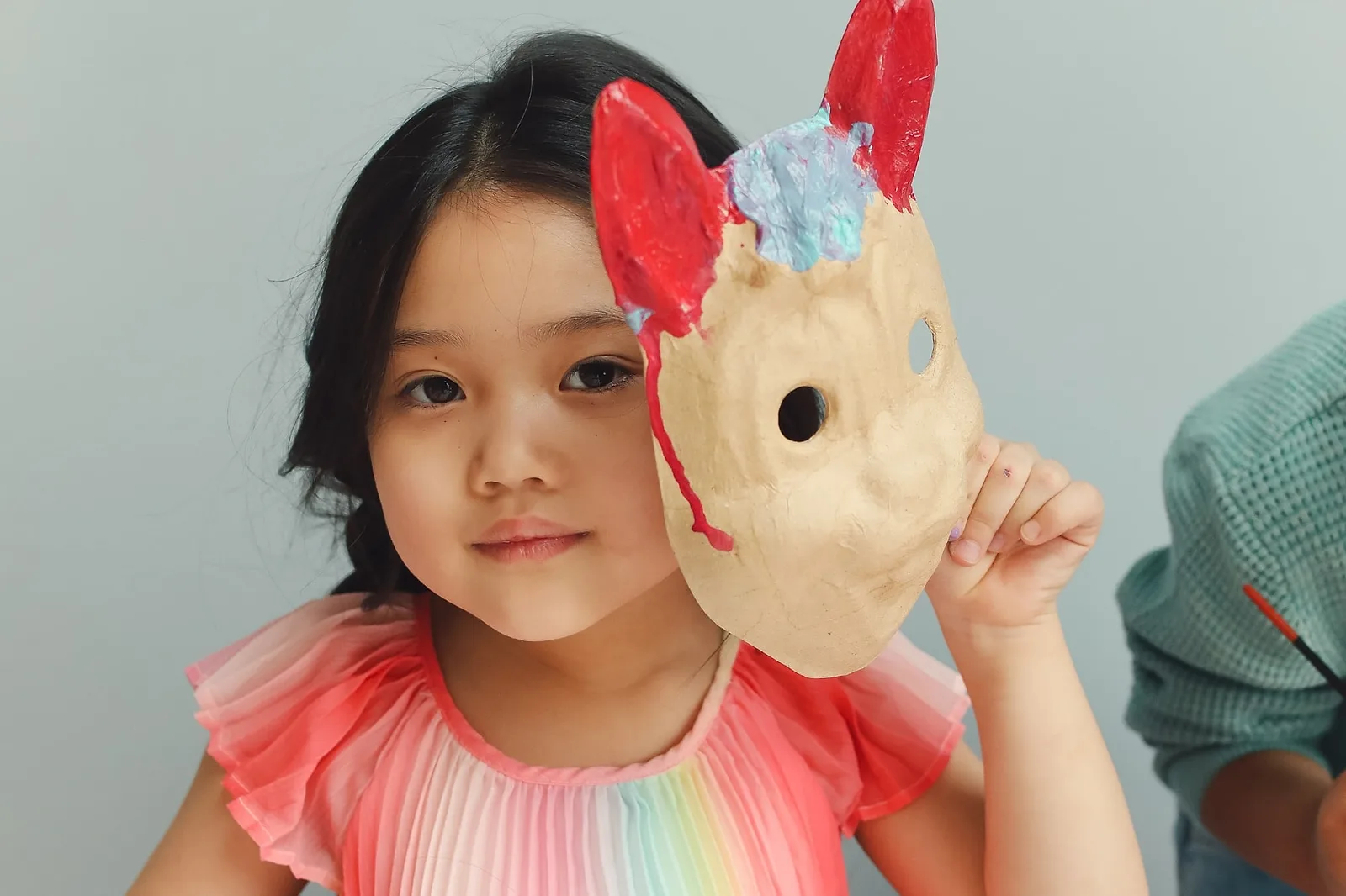 Patterned Rompers with Bunny Masks.