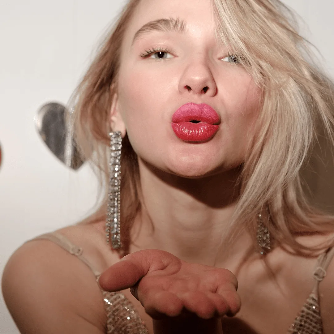 Pose #5: Blowing a Kiss.
