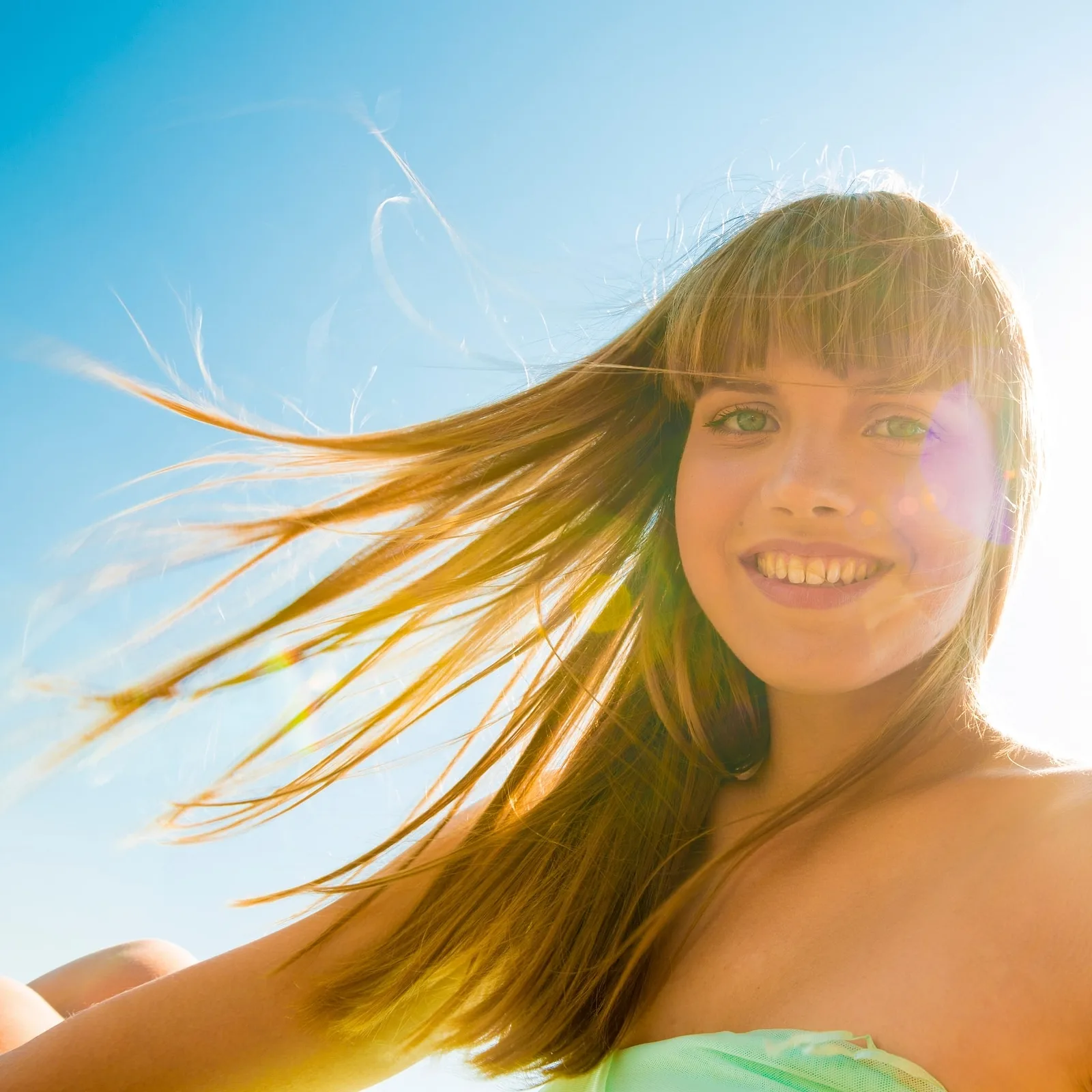 Backlit Sun‑flare Portraits.