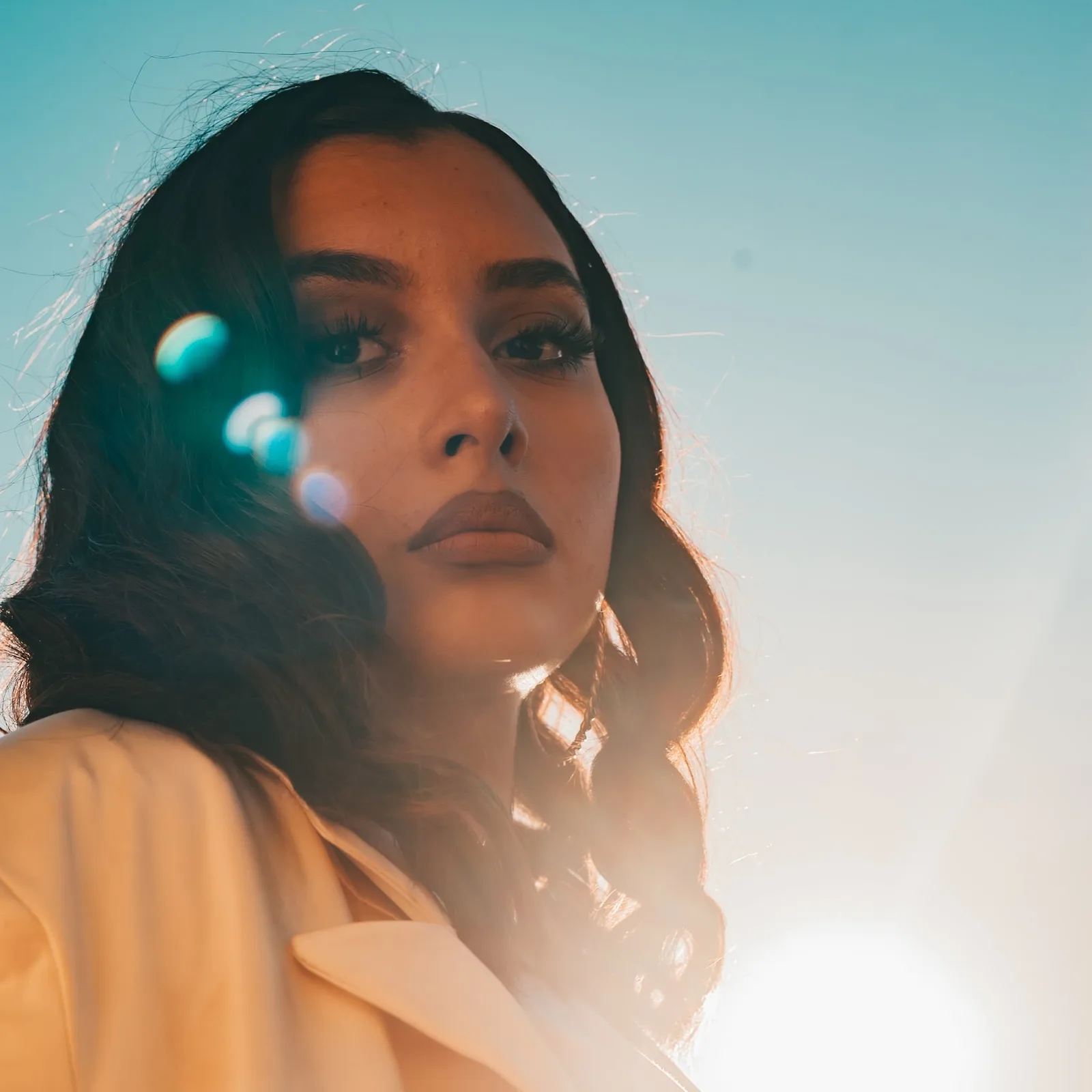 Backlit Sun‑flare Portraits.
