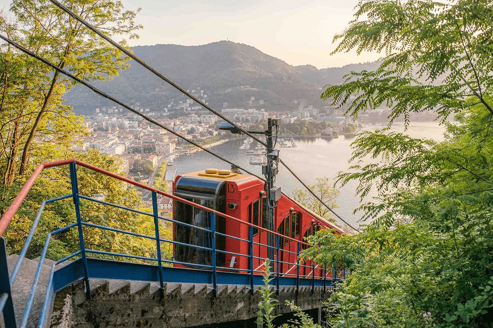 Brunate Volta Lighthouse View over Lake Como from the Volta Lighthouse terrace in Brunate above Como city at sunset