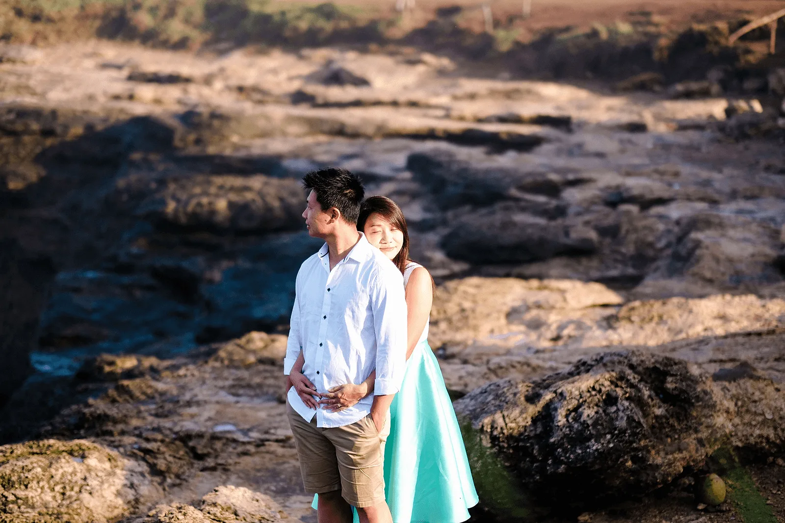 couple posing in neutral outfit in bali during photoshoot