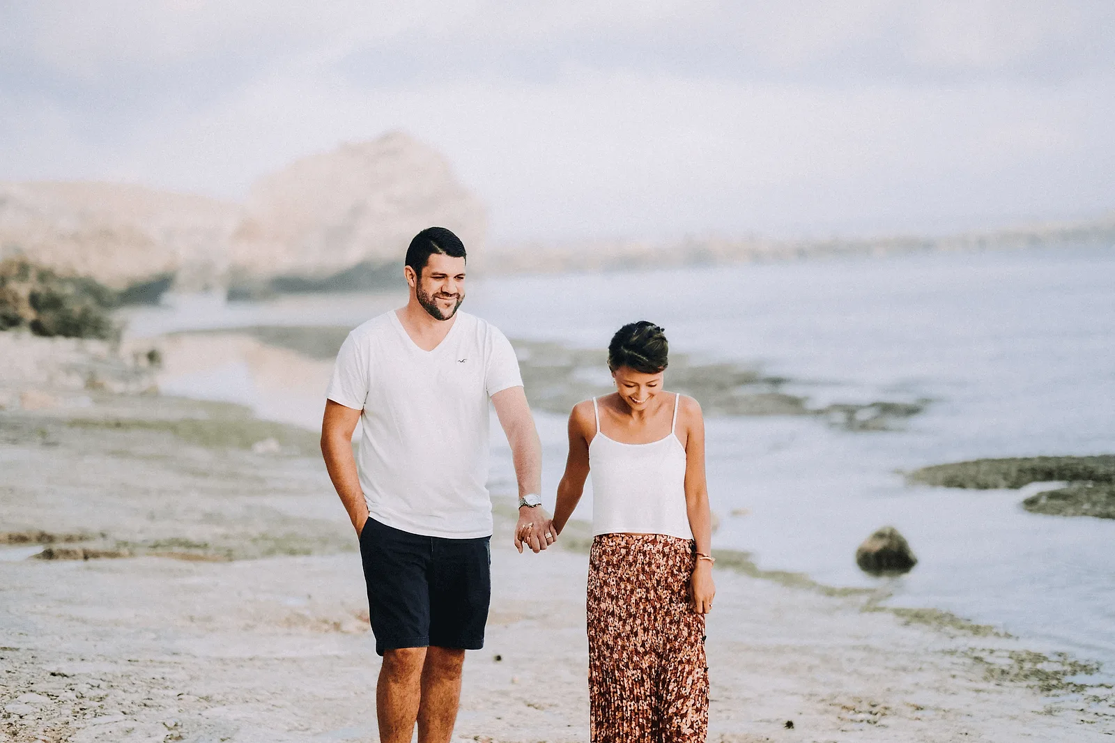 bali blue hour couple walking on the beach during photoshoot