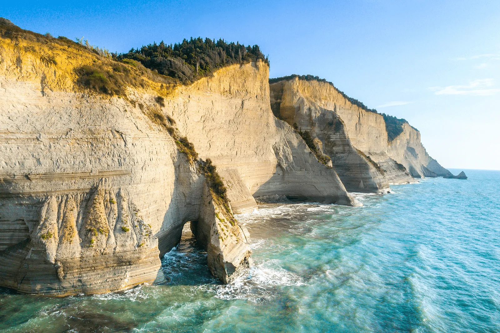 Logas Beach and amazing rocky cliff in Peroulades. Corfu Island, Greece