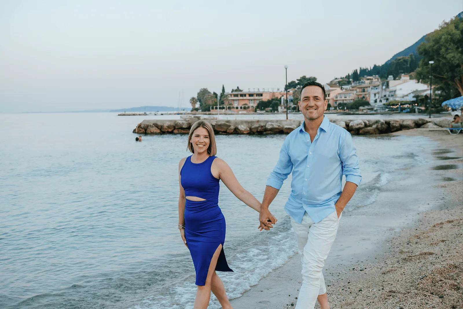 romantic walk on corfu beach during blue hour