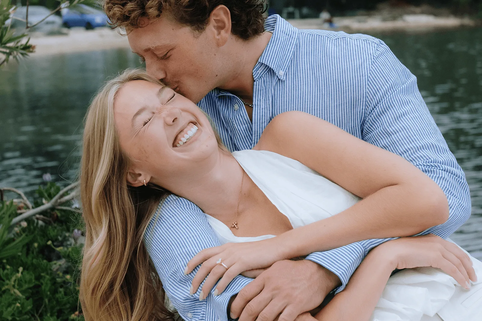 moments after proposal on corfu, future husband kissing future wife