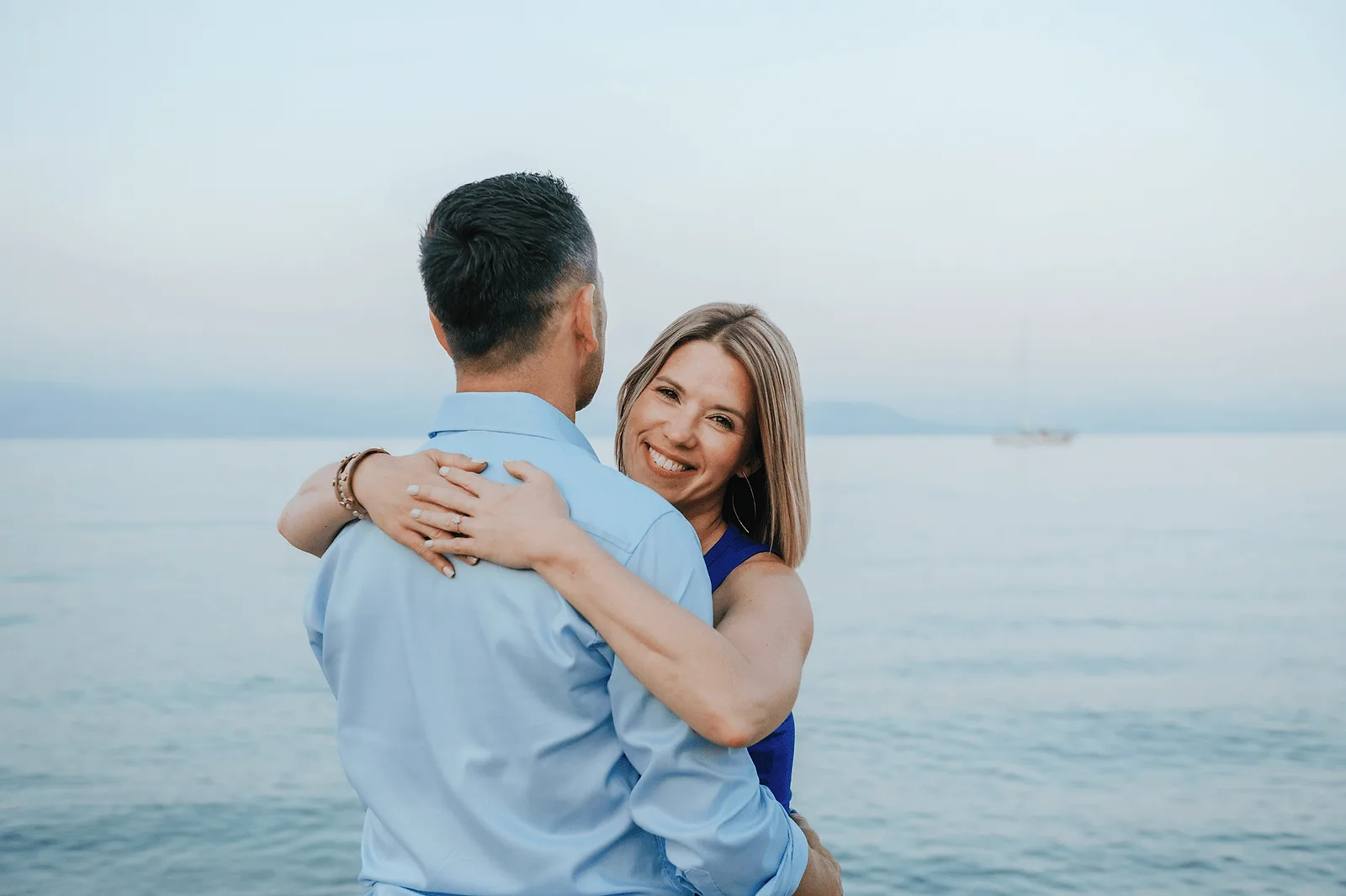 woman hugging her soon to be husband after proposal in corfu, greece