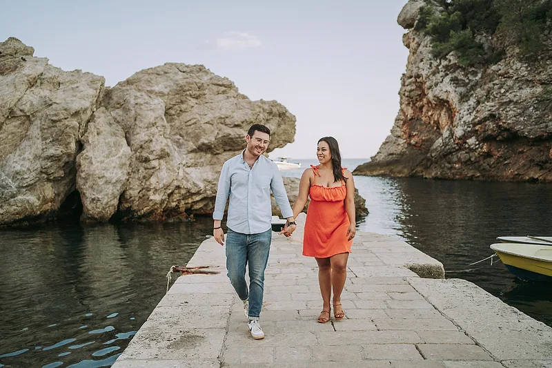 couple taking a walk in dubrovnik, croatia