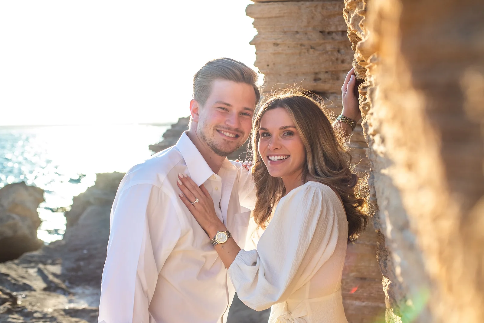 Couple smiling in sunset in Mallorca