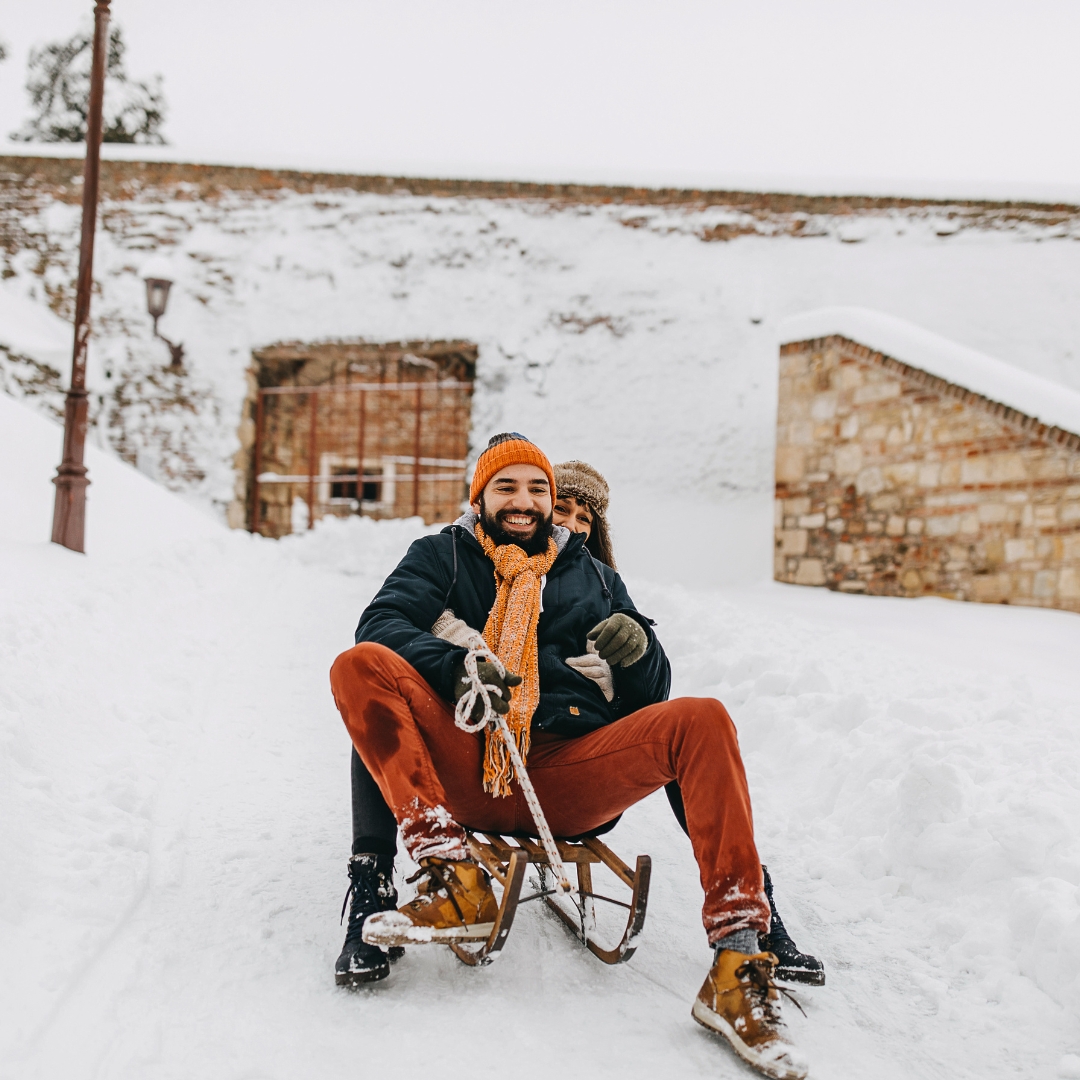 couple sledding