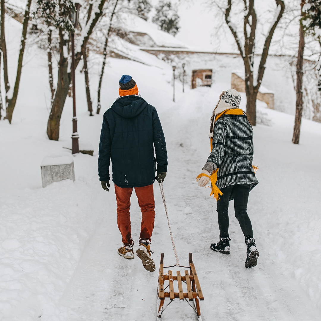 couple sledding
