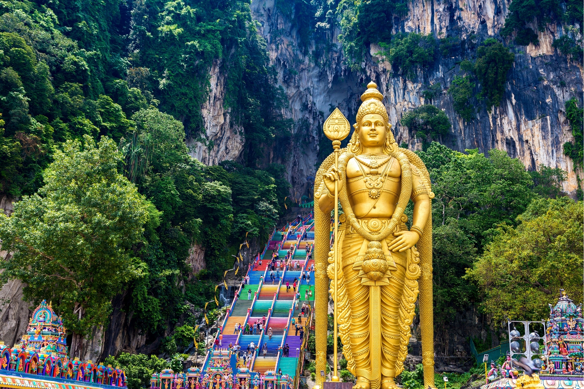 Batu Caves rainbow staircase morning light
