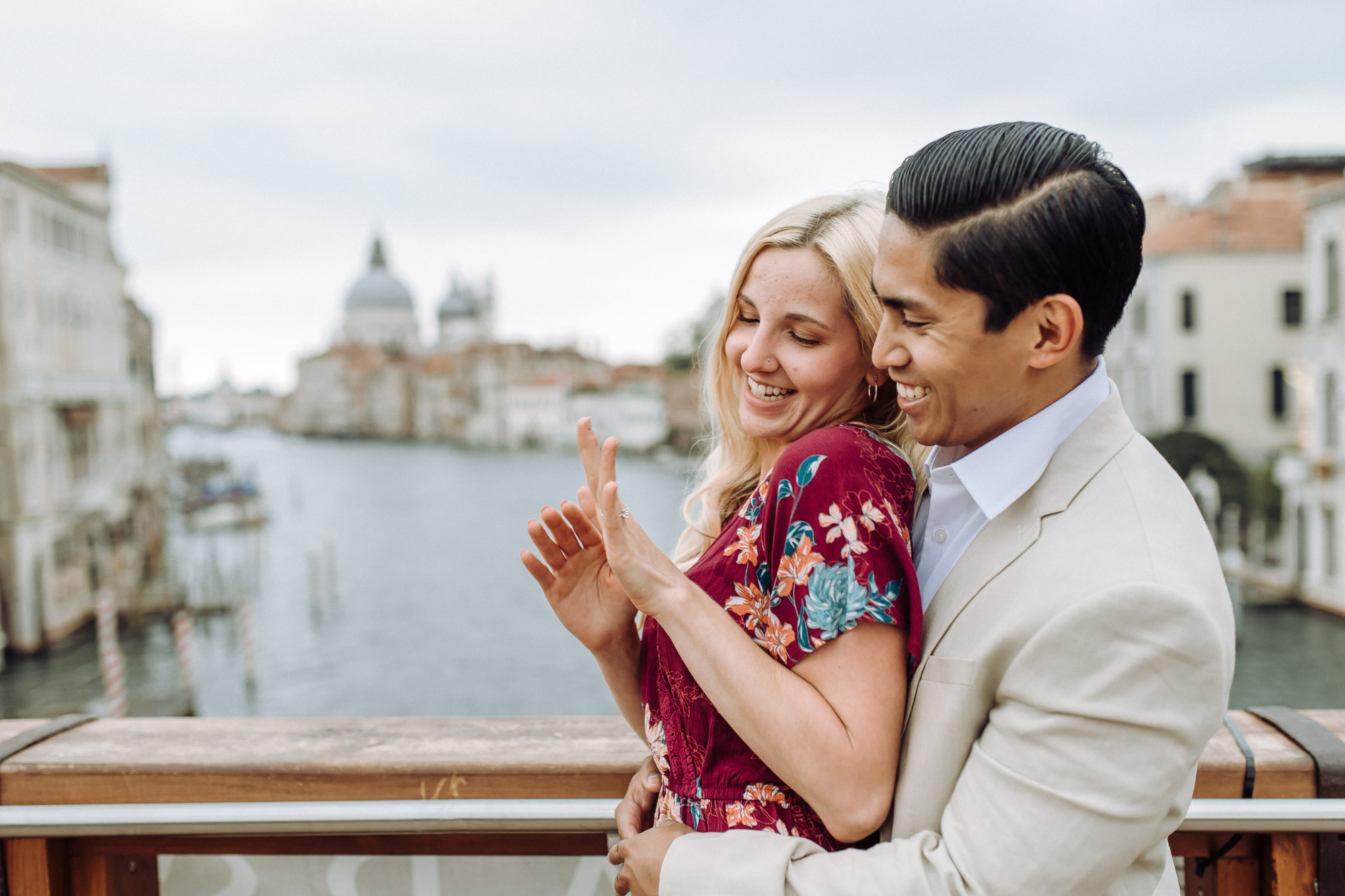 freshly engaged couple after secret proposal in venice italy