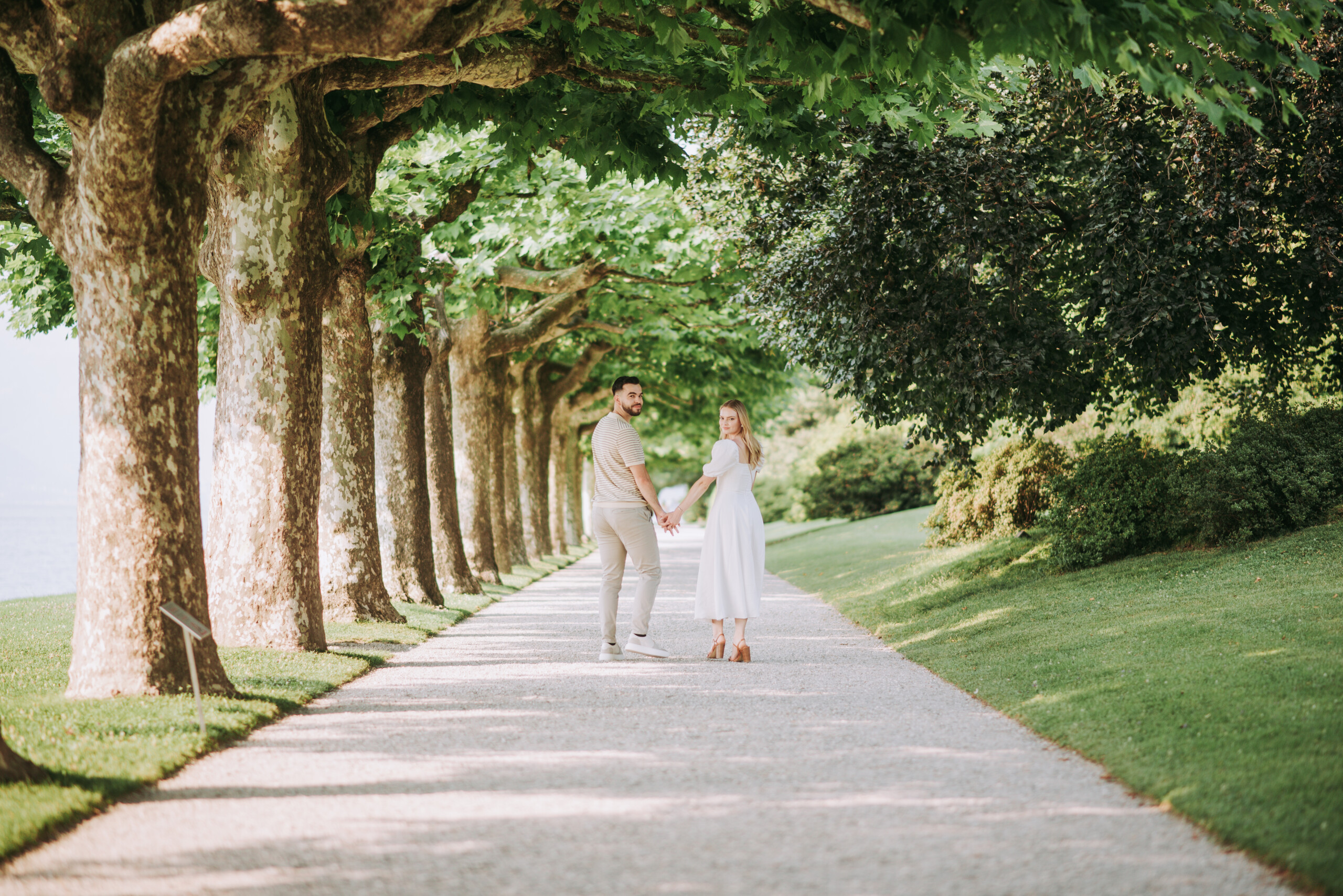 Couple walking cobbled lane: Lake Como photoshoot