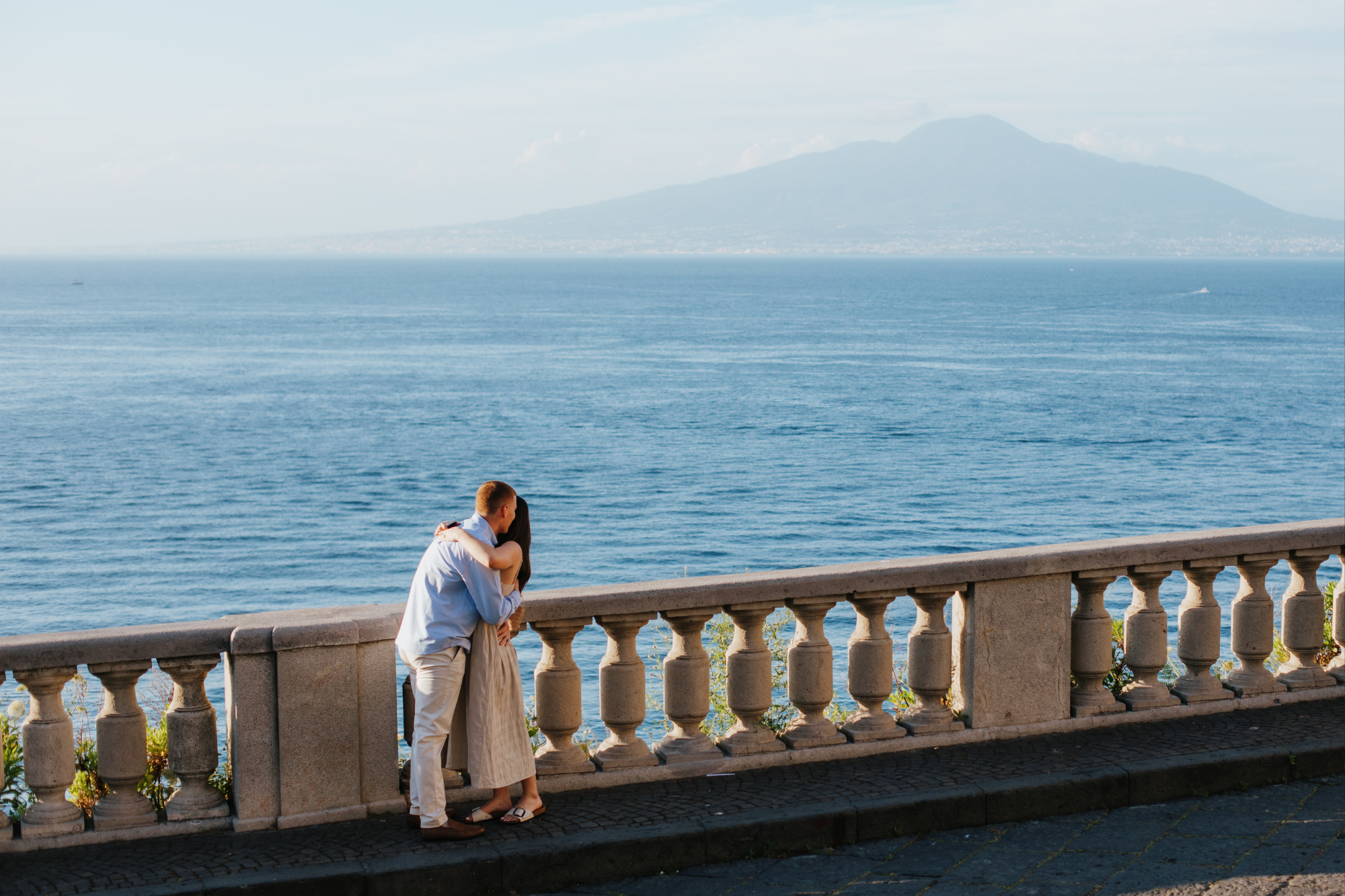 moments after proposal, couple hugging in sorrento