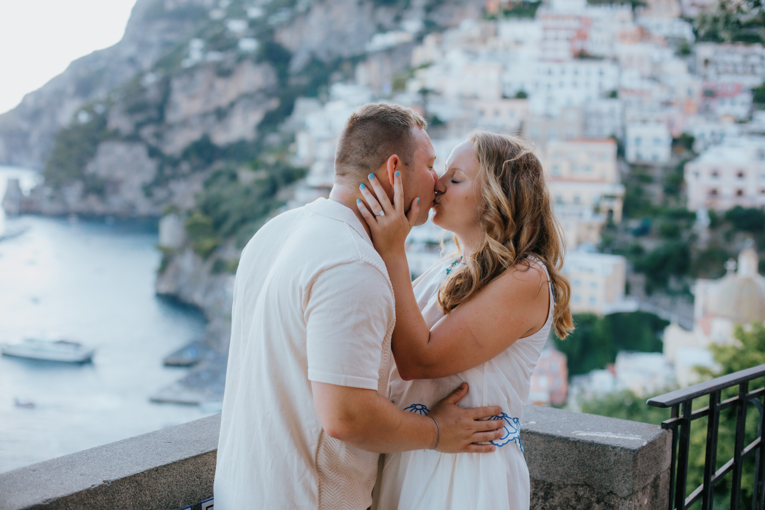 happy couple hugging and smiling at the Amalfi Coast