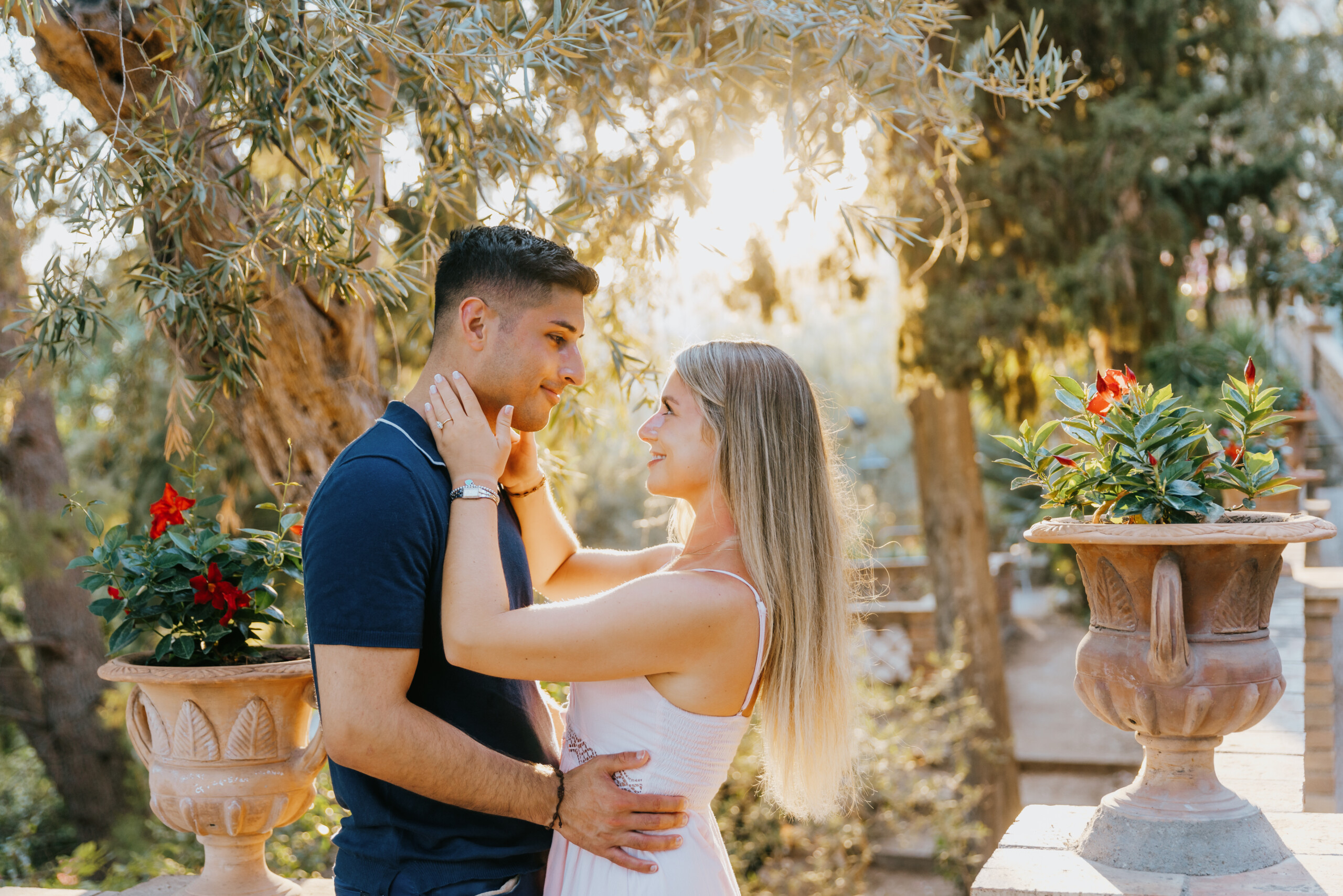 Couple lovingly gazing at each other in Taormina, Sicily