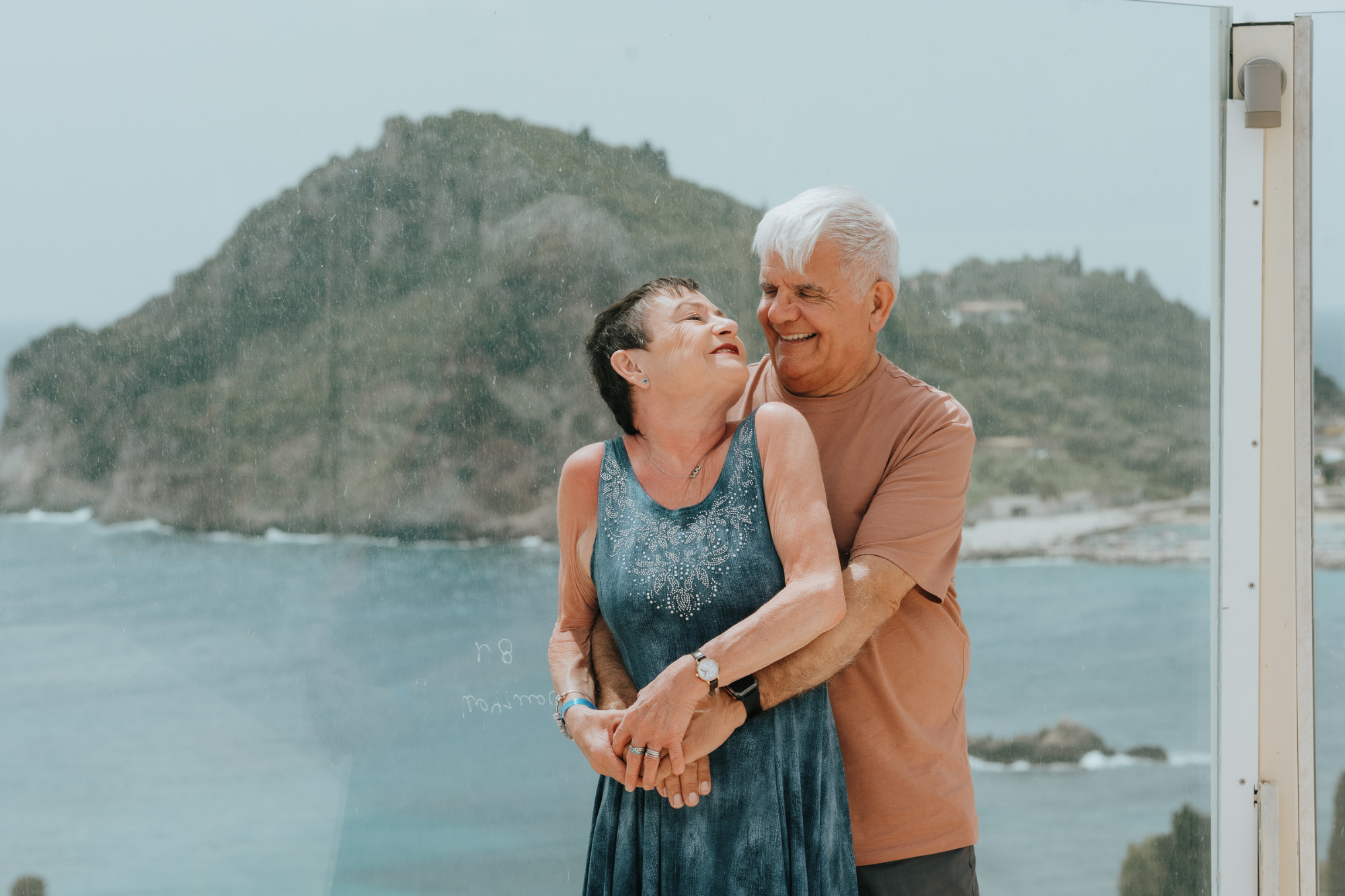 candid picture of older couple visitng corfu