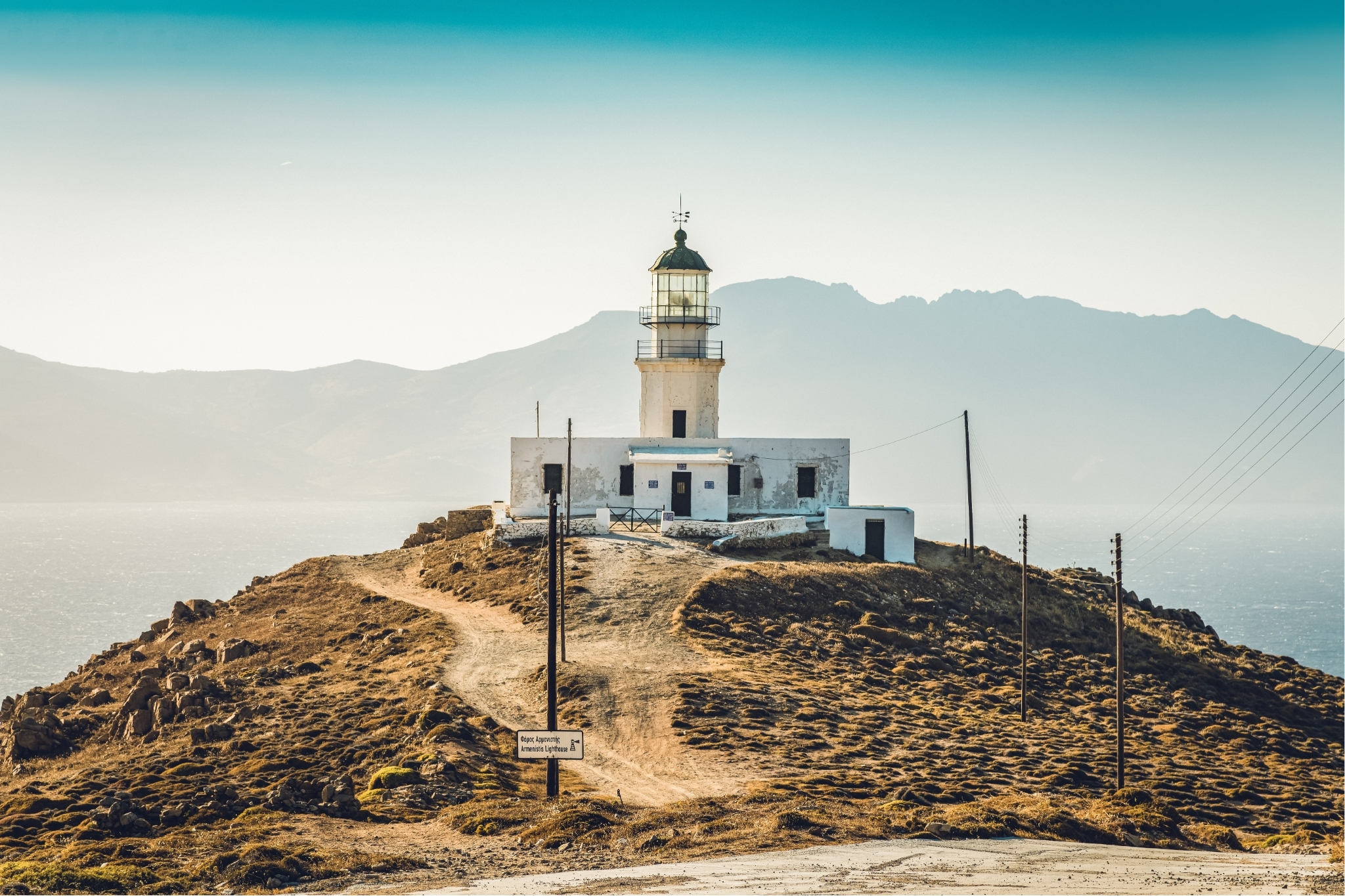 Armentisis lighthouse in Mykonos during hot summer day