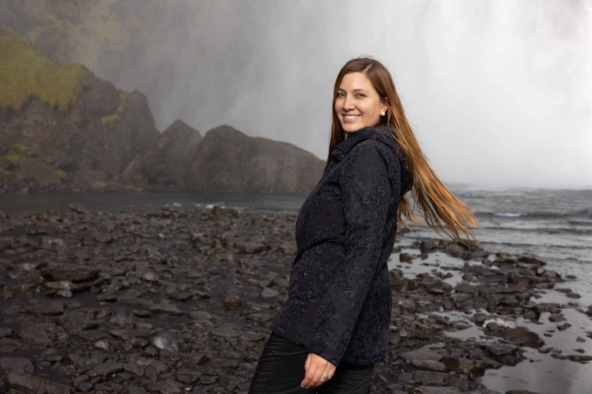 happy just engaged woman during the trip in iceland